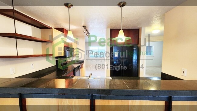 Foto del edificio - 4340 S Highland Dr