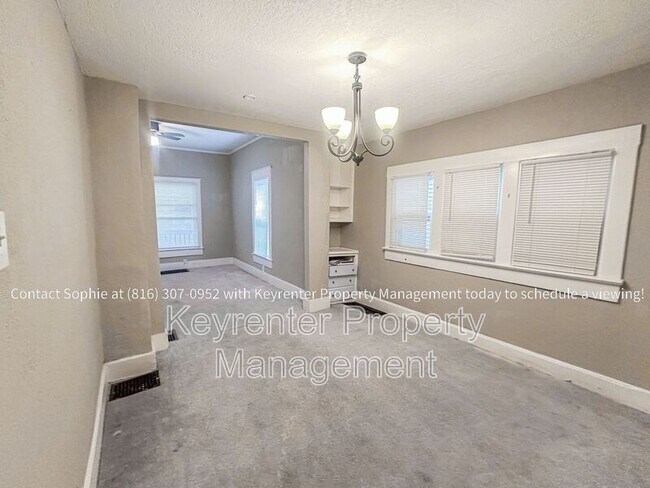 Foto del edificio - 6215 E 9th St