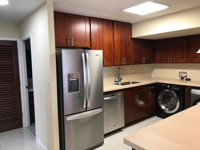 Building Photo - Kealani 2 Bdrm., 2 bath, 1 cov'd/sec'd Pkg. - Pool