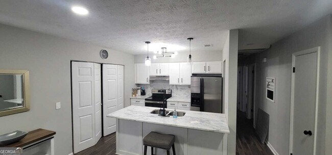 Foto del edificio - 8975 Ashwood Dr