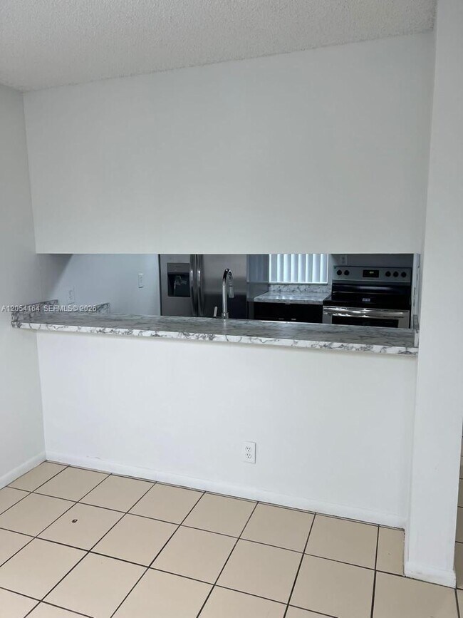Building Photo - 8720 N Sherman Cir