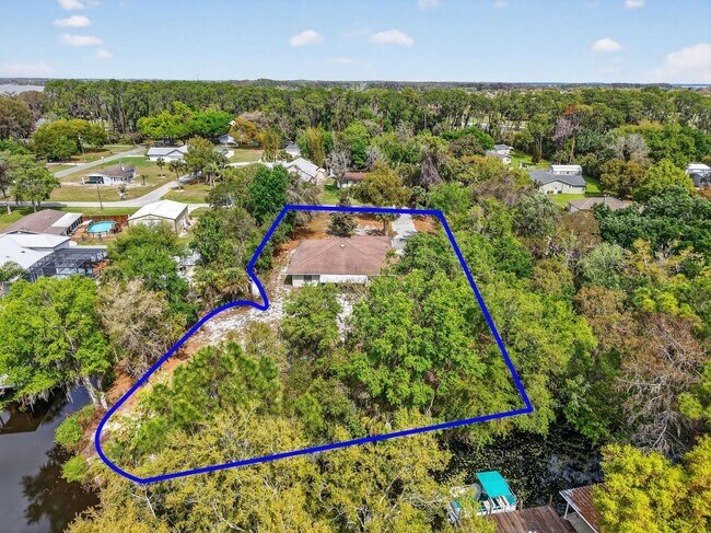 Building Photo - Fully Renovated Canal-Front Home on the Harris Chain of Lakes!