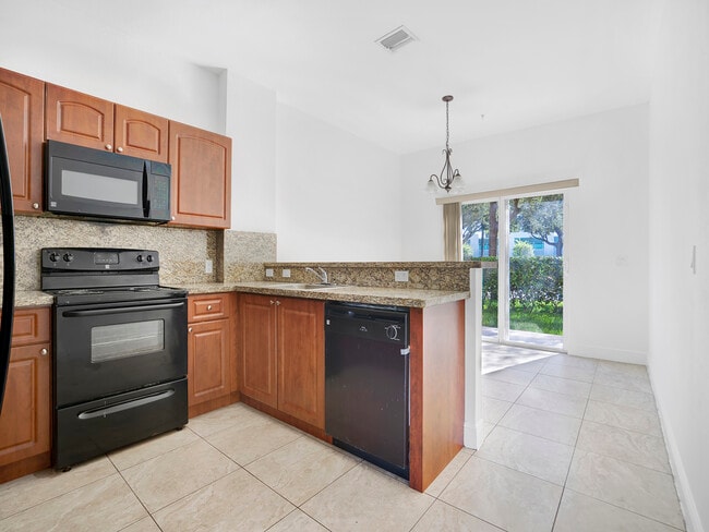 Building Photo - 18150 NW 59th Ave