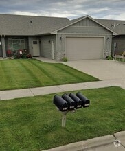Front yard, patio and 2 car garage. - 3509 E Bison Trl