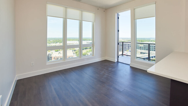 Living Room with Balcony and Hard Surface Flooring - Osprey