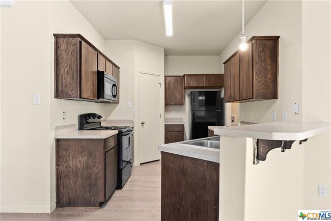 Building Photo - 5703 Rustler Dr