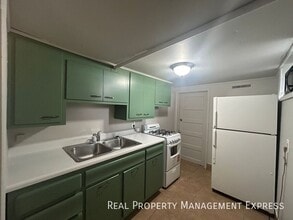 Building Photo - Lower Level Studio Apartment
