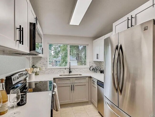 Photo - 7110 E 63rd Ave House