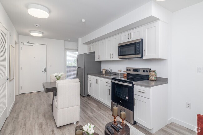 2 habitaciones, 2 baños - 650 pies cuadrados - Sala de estar - 5300 Crenshaw