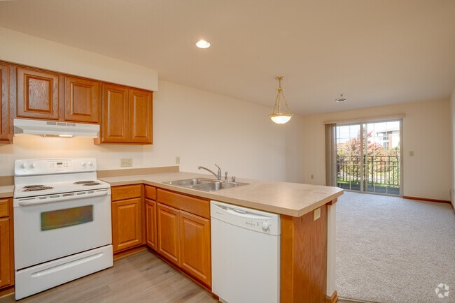 Cocina y sala de estar - Prairie Villa Senior Apartments