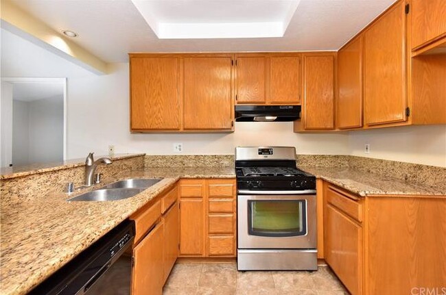 Building Photo - "Charming 1-Bedroom Condo in Anaheim – Ide...