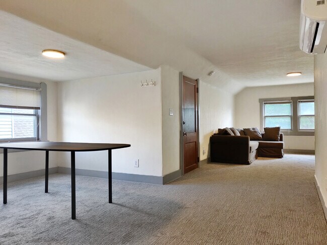 Partially furnished with dining table and comfortable sleeper sofa - 138 Cypress Ave. E