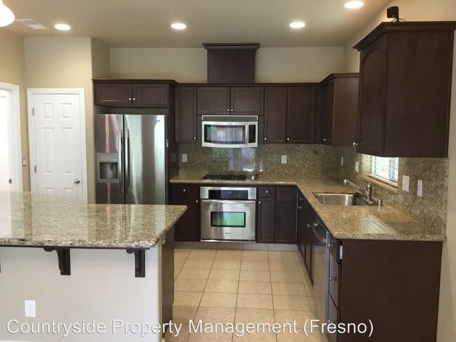 Building Photo - 3 br, 2 bath House - 5823 W. Ashcroft Avenue