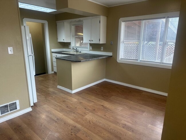 Building Photo - Room-room-room!  Fenced back yard, Private...