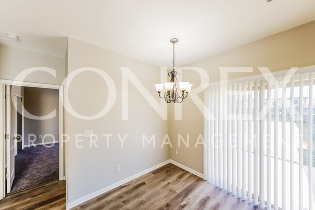 Building Photo - Beautiful Spacious Four Bedroom -- One Mon...