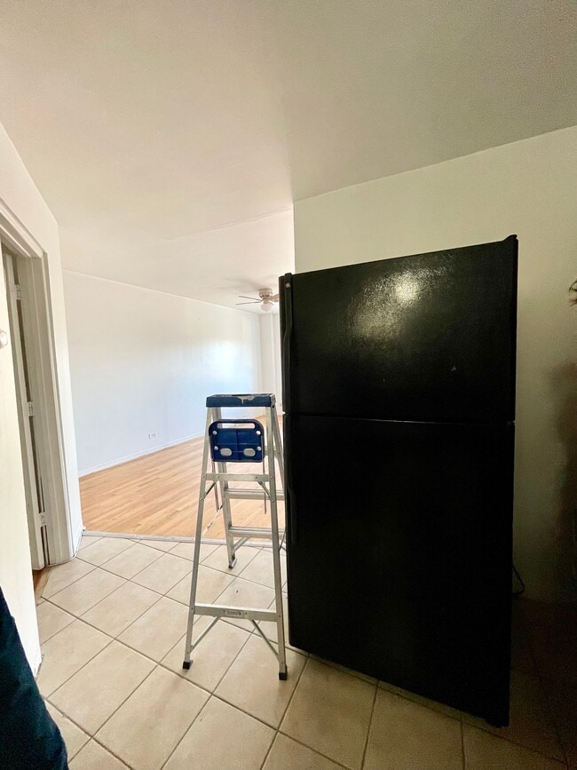 View of living room from Kitchen - 601 W 31st St