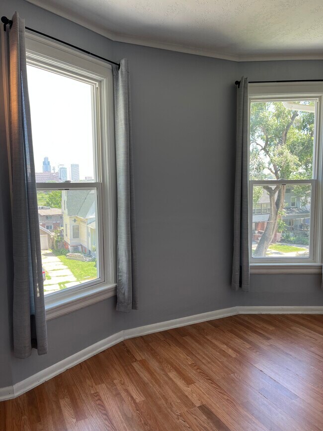 Living room with beautiful skyline view - 138 N 31st Ave
