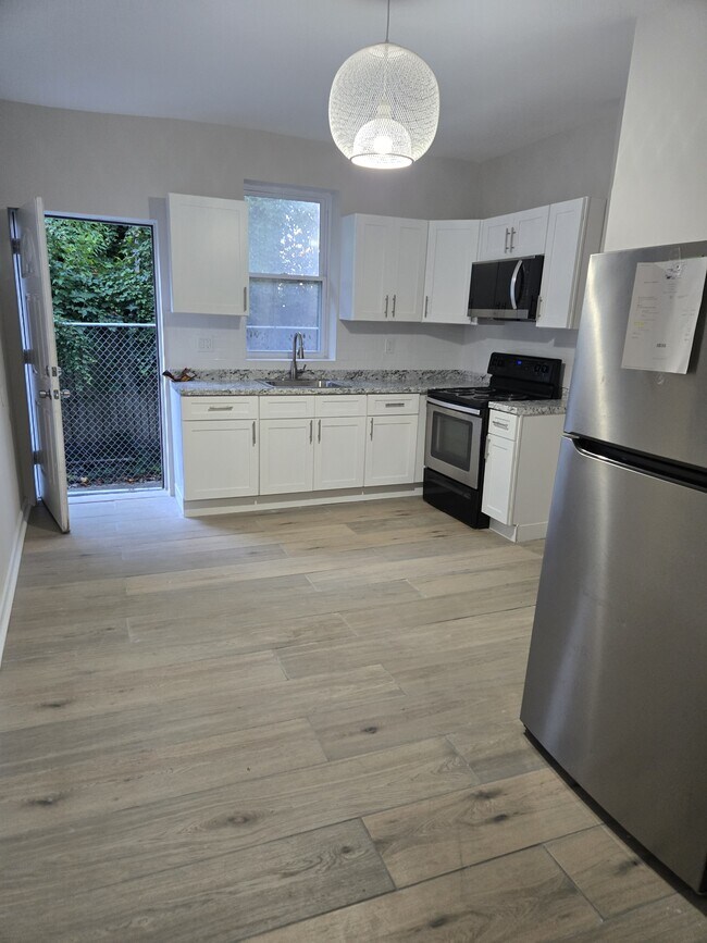 Building Photo - 6045 Delancey St
