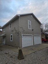 Building Photo - 301 E 7th St