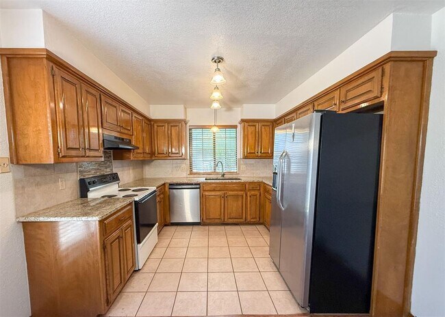 Foto del edificio - 7019 N Spinnaker Ln