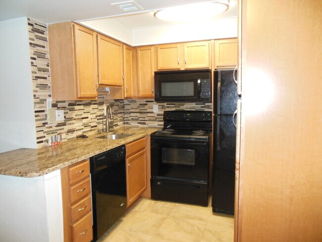 Building Photo - TWO BEDROOM TWO BATHROOM! WATERFRONT COMMU...