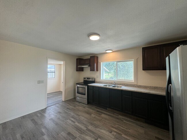 Building Photo - Non-Refundable & Security Deposit Total: $...