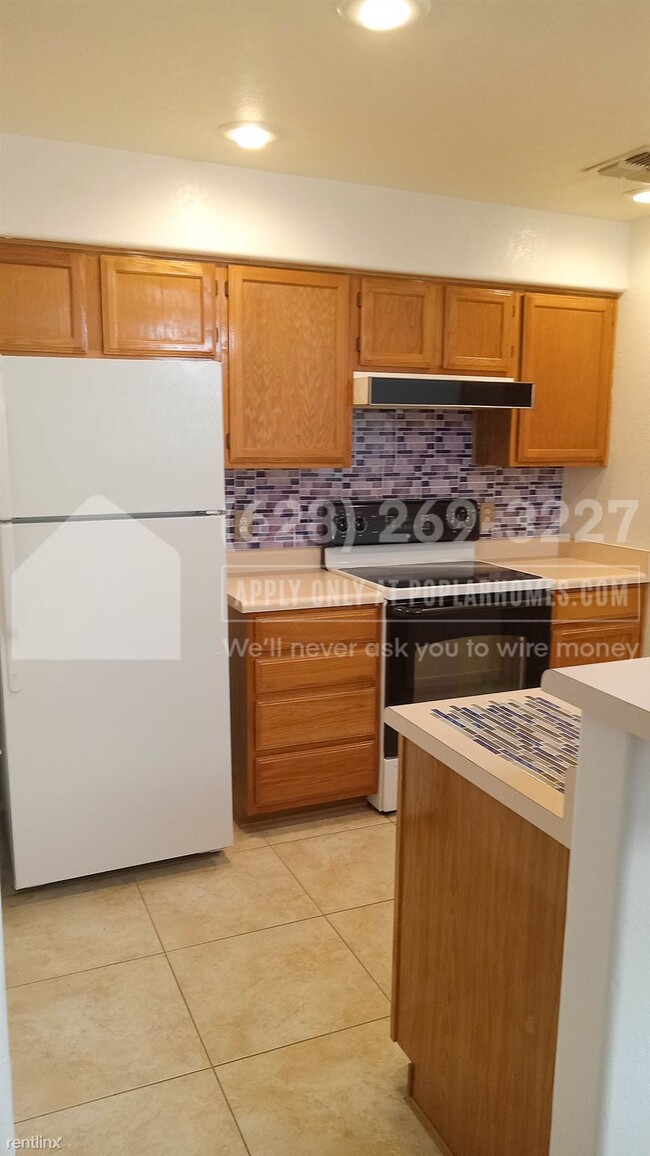 Building Photo - 2 br, 2 bath Condo - 8140 N 107th Ave Unit...