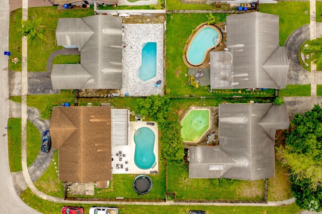 Many homes in the Burnham Woods neighborhood have pools in their backyards.