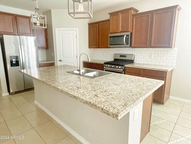 Foto del edificio - 4059 W Coneflower Ln