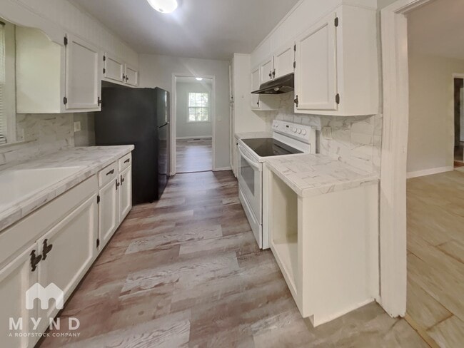 Foto del edificio - 5454 Faucett Rd