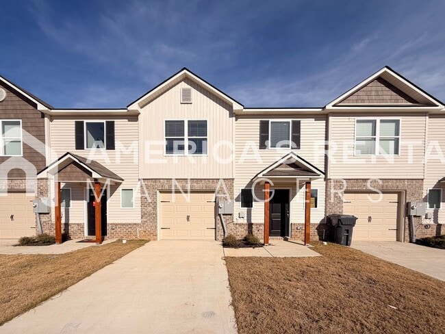 Building Photo - Spacious Two-Story Townhome with Open Layout!