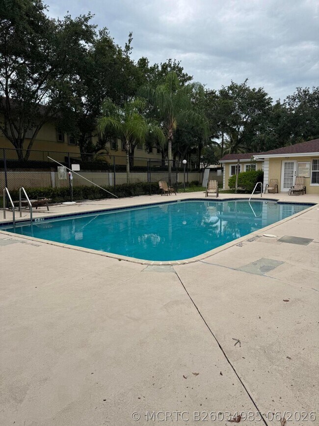 Foto del edificio - 1803 Palm Beach Trace Dr