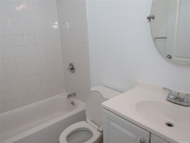Building Photo - 212-72 16th Ave
