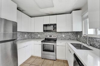 Building Photo - 1154 NW 103rd St