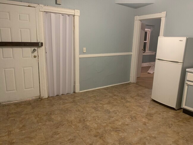 Kitchen- door to basement and bldg exterior - 1900 Belt Ave