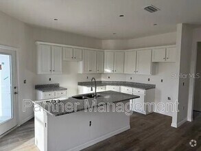 Building Photo - 16125-16127 Badalona Dr