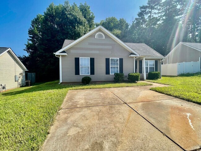 Building Photo - This lovely three bedroom two bath home
