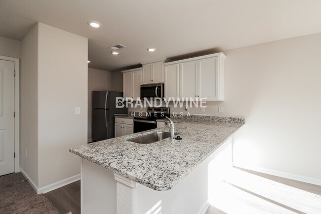 Building Photo - NEW Lower Rental Rate Leasing Special: Mar...