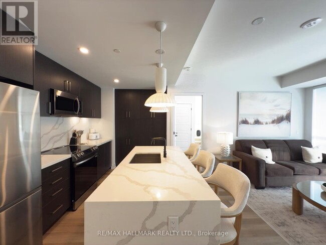 Photo du bâtiment - 415-415 Sea Ray Ave