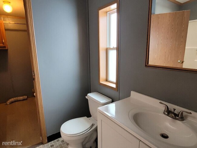 Foto del edificio - 3 br, 2 bath Mobile Home - 123 W 9th St