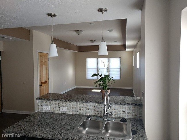 Foto del edificio - 1458 E 115th St
