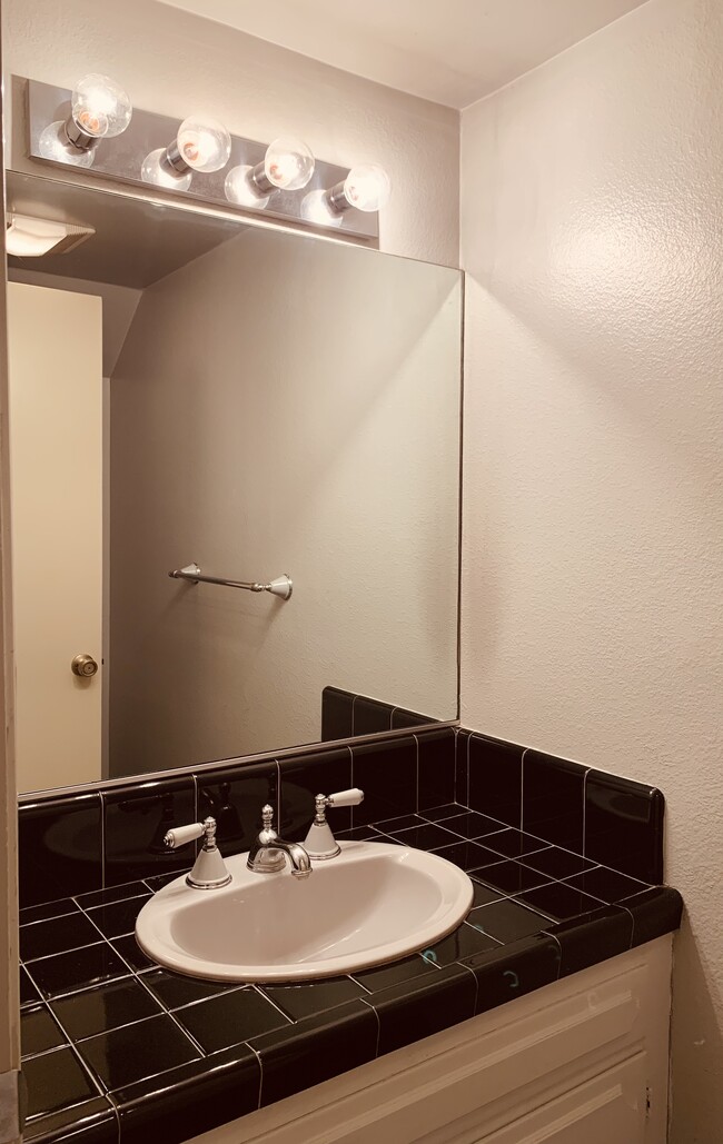 Half bath lower level - 3060 Honolulu Ave