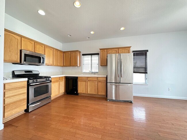 Building Photo - 4 bedrooms, 2 1/2 Baths with a 3 Car Garag...