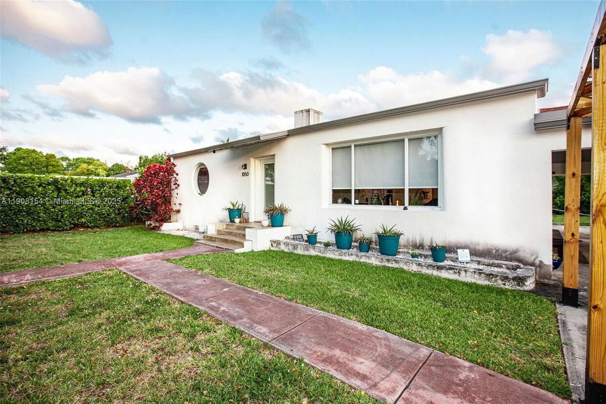 Photo - 1050 Northwest 46th Street Apt #1050, Miami, FL 33127 - 3 BR 2 BA single-family home