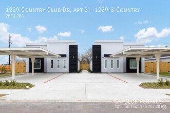 Building Photo - 1229 Country Club Dr