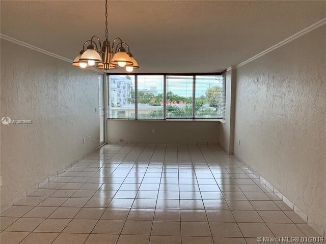Building Photo - 8233  Harding Ave  302