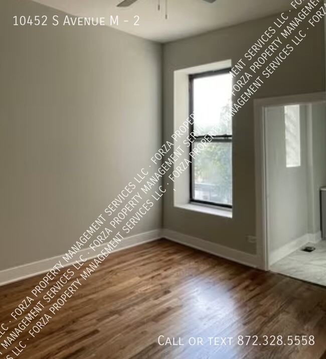 Building Photo - 10452 S Ave M