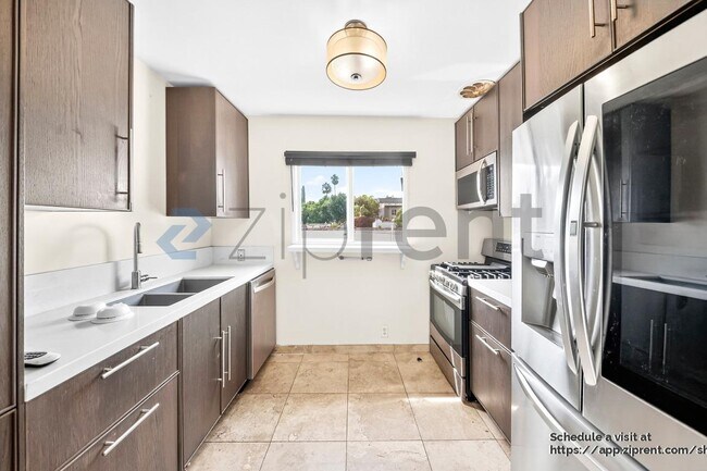 Foto del edificio - 1435 N Fairfax Ave