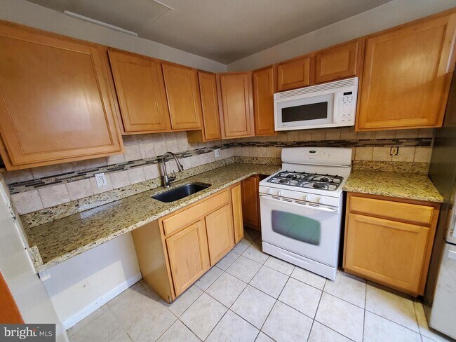 Building Photo - 8030 Lowber Ave