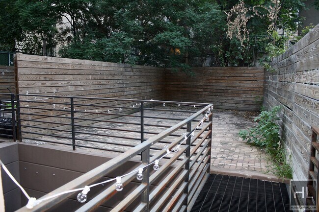 Building Photo - Duplex w/ two private outdoor spaces, and ...